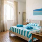 Copriletto in cotone a righe turchese - Coton Boutique